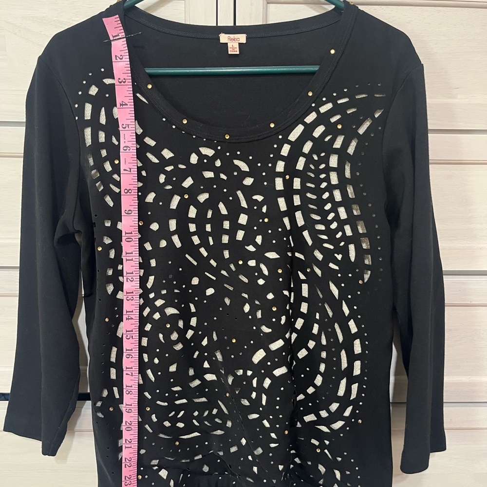 Women black top with quarter sleeve. Black a tan